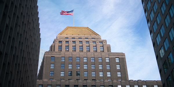 Government building with American flag waving on top