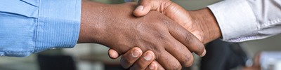 two men handshaking